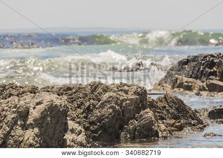 Strong Waves, Stones And Sea Cliffs, Sea Point Promenade In Cape Town, South Africa.