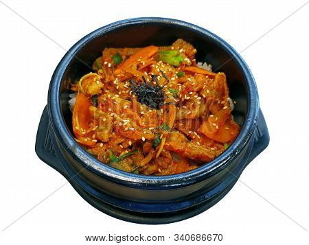 Korean Food, Stir Fried Pork With Kimchi On Rice.