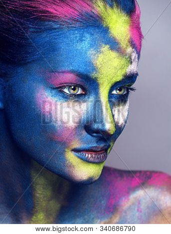 Beauty Woman With Creative Make Up Like Holy Celebration In India Closeup