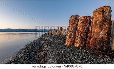 Goose Spit Regional Park Beach With Logs On Vancouver Island, In The Comox Valley, British Columbia,