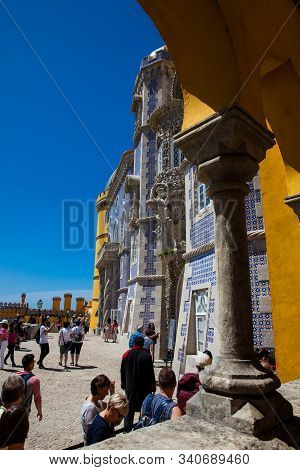 Sintra, Portugal - May, 2018: Tourists Visiting The Pena Palace A Romanticist Castle Located In Sao 