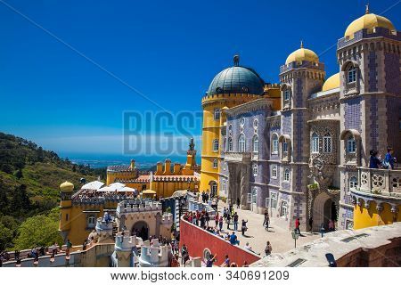 Sintra, Portugal - May, 2018: Tourists Visiting The Pena Palace A Romanticist Castle Located In Sao 