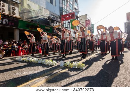 Puli, Taiwan - December 14th, 2019: people parade in Puli carnival at Nantou, Taiwan