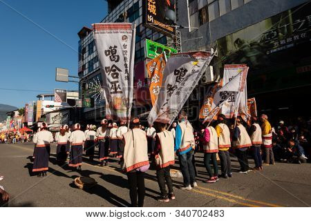 Puli, Taiwan - December 14th, 2019: people parade in Puli carnival at Nantou, Taiwan