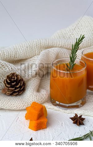 Fresh Drinking. Winter Decoration. Cocktail With Sprig Of Rosemary With The Warm White Plaid On Whit