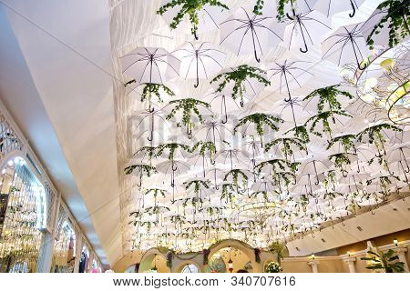 White And Green Unbrellas On Downtown : Hang On The Ceiling, In The Restaurant . White Unbrellas Bac