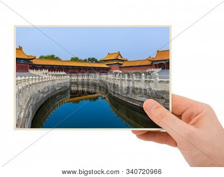 Hand and Gugong Forbidden City Palace - Beijing China (my photo) isolated on white background