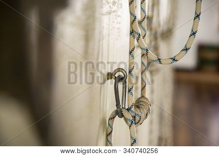 Yoga Ropes Hanging On Empty Studio Wall. Iyengar Yoga