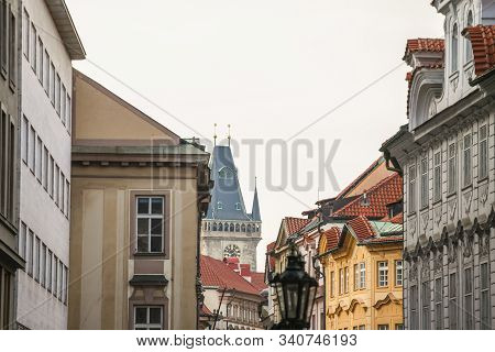 Old Town Hall Tower, A Clock Tower, In Prague, Czech Republic, Taken From The Narrow Streets Of Old 