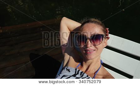 Woman Shooting Self Portrait. Take Photo And Video On Smartphone. Girl Rest, Relax, Walk In Sunglass