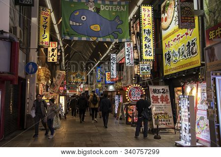 Osaka, Japan- 27 Nov, 2019: Beautiful Landscape View Of Japanese Store With Crowd Of Peoples And Tou