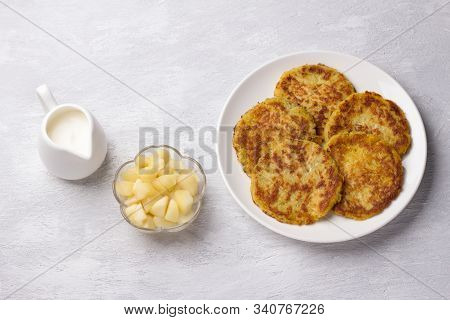 Traditional Latkes Fritters With Sour Cream And Apple Sauce On Light Gray Textured Background, Top V