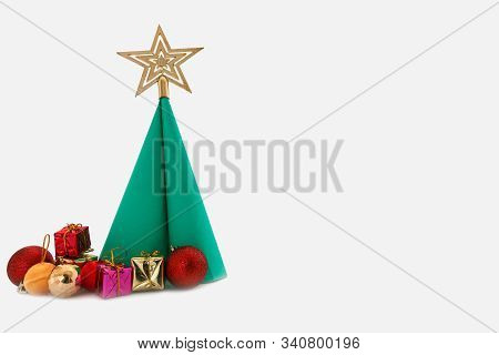 Paper Christmas Tree ,with  Ball And Gift,ornament On White Background,copy Space