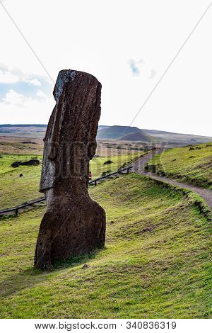 Moai On Ranu Raraku Volcan. Ester Island Landscape