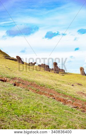 Moai On Ranu Raraku Volcan. Ester Island Landscape