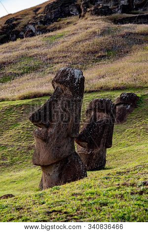 Moai On Ranu Raraku Volcan. Ester Island Landscape