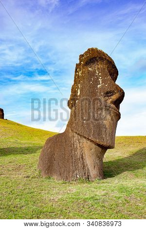 Moai On Ranu Raraku Volcan. Ester Island Landscape