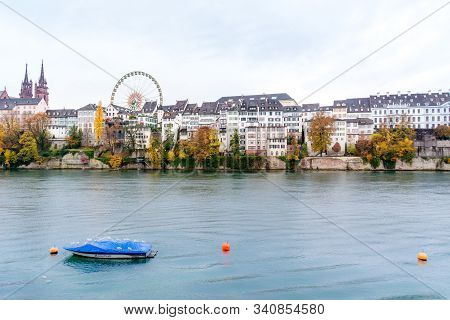 Basel, Switzerland - November 11th, 2018: View Of Basel And Its Cityscape Through Rhine River, And A