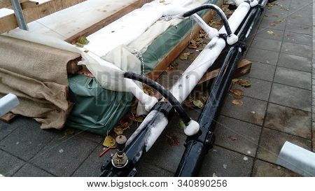 Artificial Ice Rink In The City Center. Equipment For Creating Ice Cover. Slippery Ice That Is Easy 