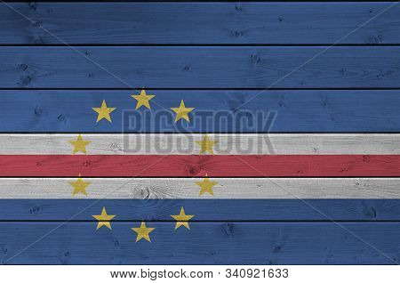 Cabo Verde Flag Depicted In Bright Paint Colors On Old Wooden Wall. Textured Banner On Rough Backgro