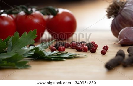 Fresh Vegetables On The Table. Food Background. Close Up. Cherry Tomatoes, A Bunch Of Parsley, Chopp