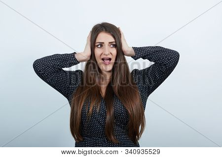 Attrractive Caucasian Woman Over Isolated Gray Background Wearing Casual Black Dress With White Polk