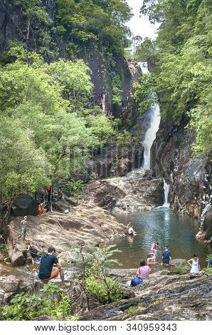 Koh Chang, Thailand - June 2015 - Tourists Cool Off In The Pool At The Foot Of Khlong Phlu Waterfall