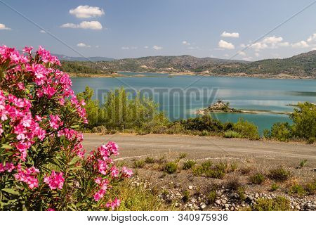 Scenic View At The Gadoura Water Reservoir On Rhodes Island, Greece With Blue And Turquoise Water, P