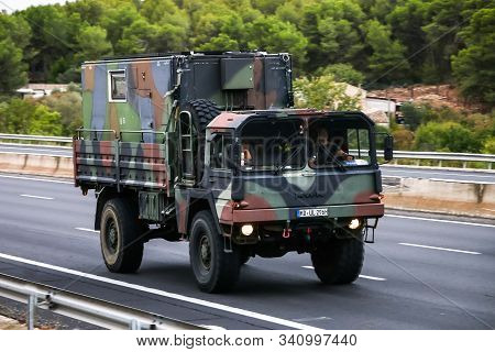 Occitanie, France - September 10, 2019: Retro Military Truck Man Hx At The Interurban Freeway.