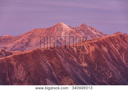 Sunrise In Fagaras Mountains, Romania. Lespezi Peak 2517m And Negoiu Peak 2535 M