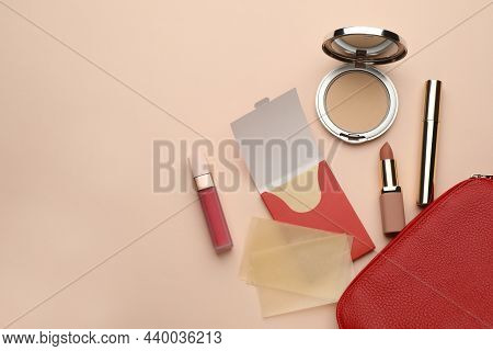 Flat Lay Composition With Facial Oil Blotting Tissues And Makeup Products On Beige Background, Space