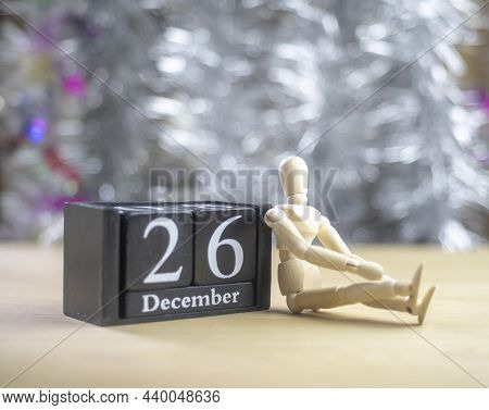 Manakin Leaning Against A Wooden Block  Date 26 December  Thinking That  The Boxing Day, The Shoppin