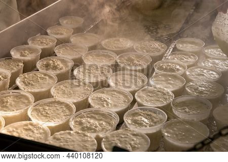 Process Of Making Fresh White Soft Ricotta Whey Cheese On Small Cheese Farm In Parma, Italy