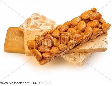 Turron Nougat - Traditional Almond And Caramel Dessert Isolated On White Background. Christmas Turro