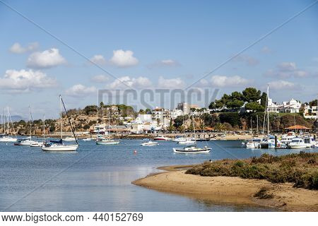 Coastal Landscape With Boats In Alvor, Algarve, Portugal
