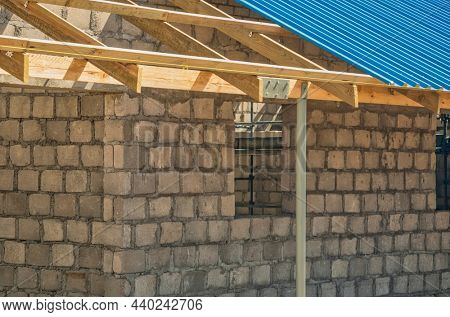 metal sheets half done roof at a residential house