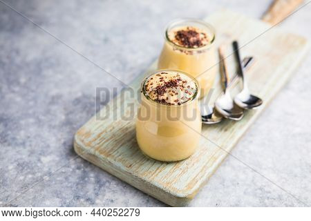 Custard Cream In Glasses With Chocolate, Milk Pudding. Natillas, Typical Christmas Dessert Made Of M
