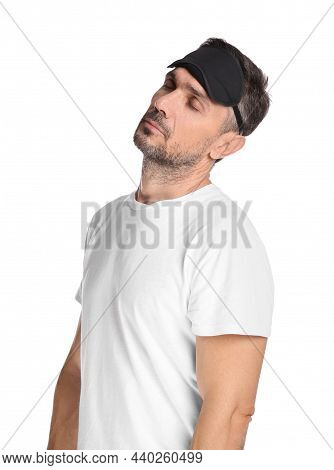 Man With Eye Mask In Sleepwalking State On White Background
