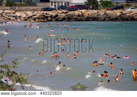 2 Mai, Romania - August 07, 2020: People Swimming In The Beach