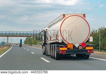 Tank Truck On The Road Transporting Gasoline From Refinery To Gas Station, Vehicle Dashcam Pov Image