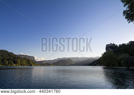 Selective Blur On The Bled Castle, Also Called Blejski Hrad, During Summer, At Sunset, By The Mounta