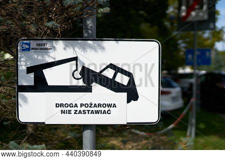 Sign At An Access Road To A Parking Lot In Kolobrzeg In Poland With The Inscription Parking On The R