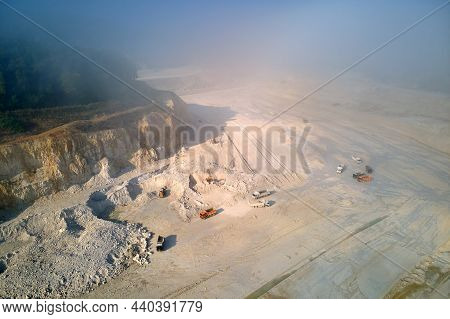 Aerial View Of Open Pit Mining Site Of Limestone Materials Extraction For Construction Industry With