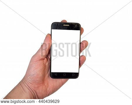 Mockup. Phone In The Hand Of A Man. Blank White Space On The Phone Screen. Mock-up