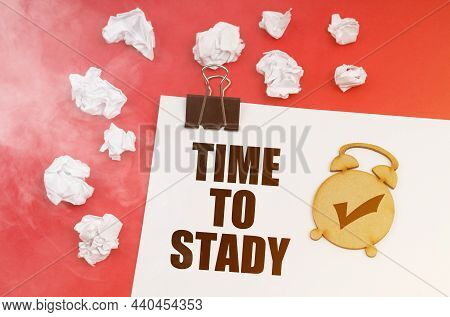 Business And Finance Concept. On A Red Background In Smoke, Crumpled Paper And A Sheet With The Insc