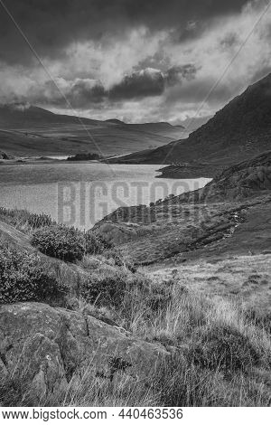 Black And White Epic Early Autumn Fall Landscape Of View Along Ogwen Valley In Snowdonia National Pa