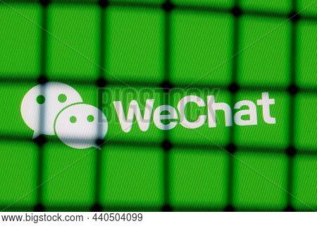 Kazan, Russia - Nov 16, 2021: The Logo Of The Wechat Messenger Behind Bars. The Concept Of Wechat Ce