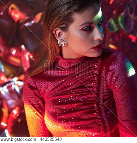 Portrait Of A Young Beautiful Woman On A Shimmering Background, Iridescent Colored Light, Futuristic
