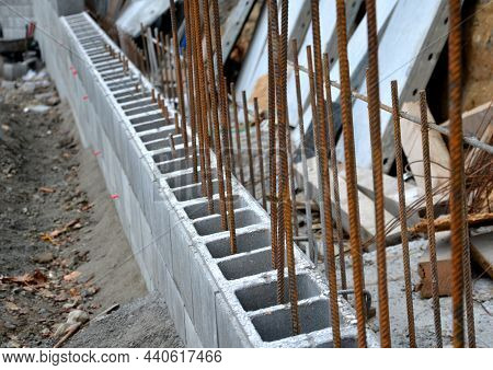 Unsightly Road Notch Of The Bridgehead. Retaining Wall With Concrete Grouting And Drainage. Fencing 