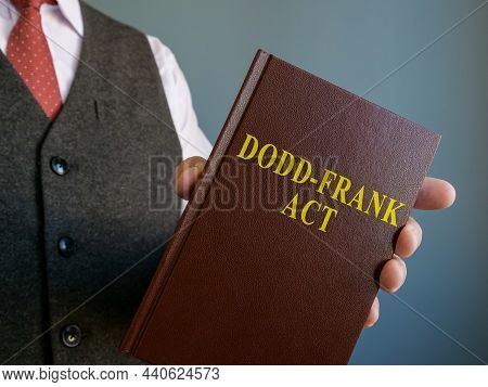 Lawyer Shows Dodd-frank Act In The Hands.